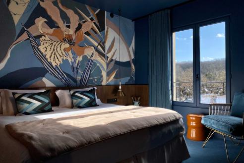 lit de la chambre prestige - hotel spa yvelines